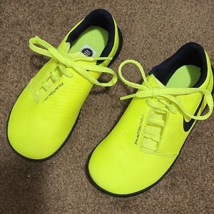 Nike Phantom neon yellow cleatless soccer shoes.